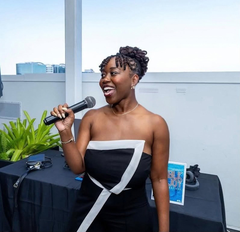 Rebecca Desir speaking at a community event